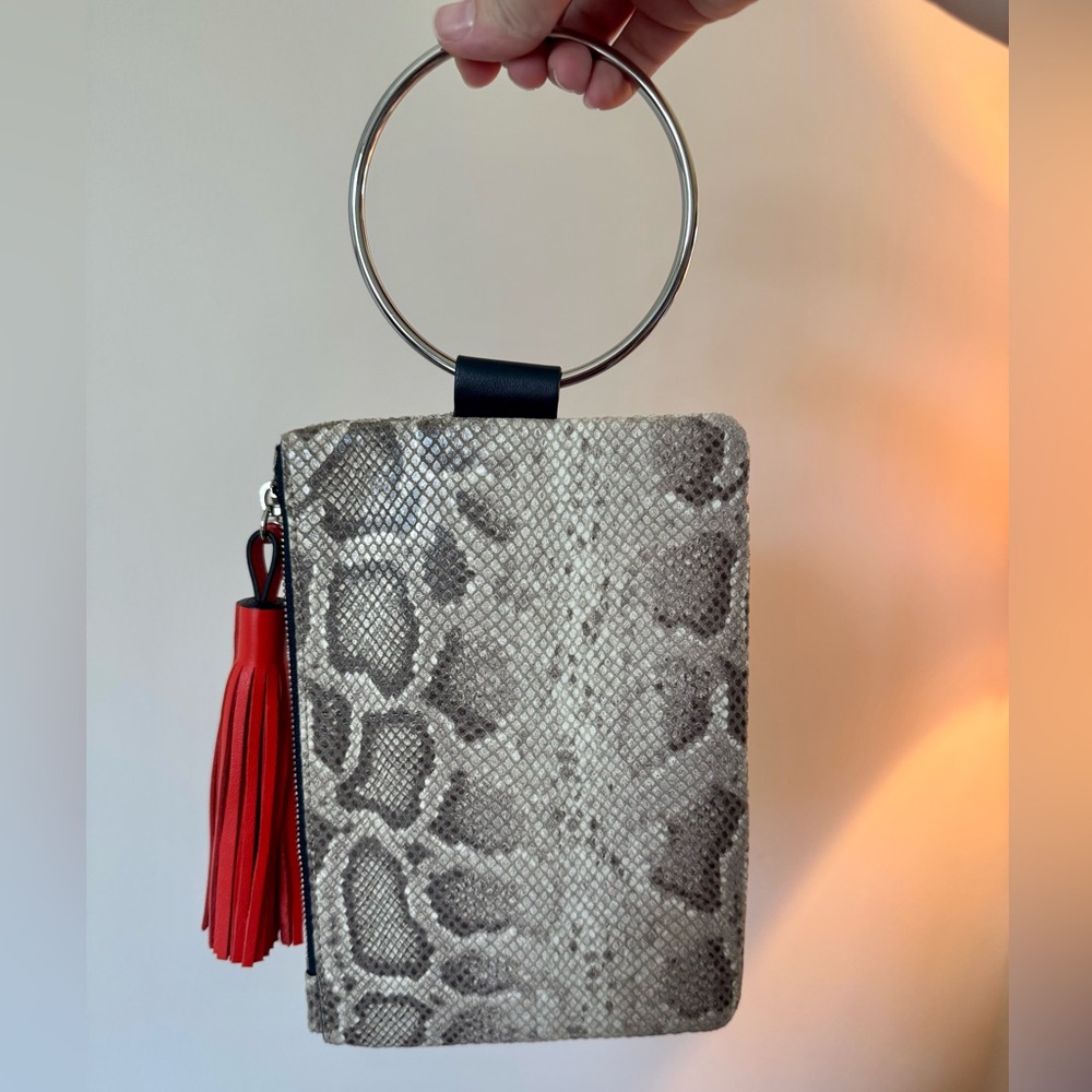 Thacker Nolita Snake Print Wristlet with Orange Tassel